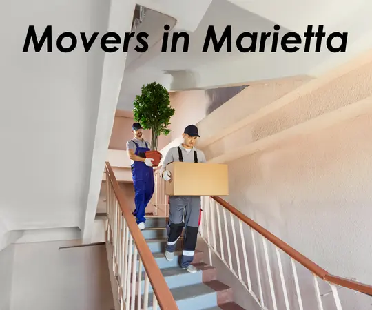 Professional movers in Marietta GA loading a moving truck